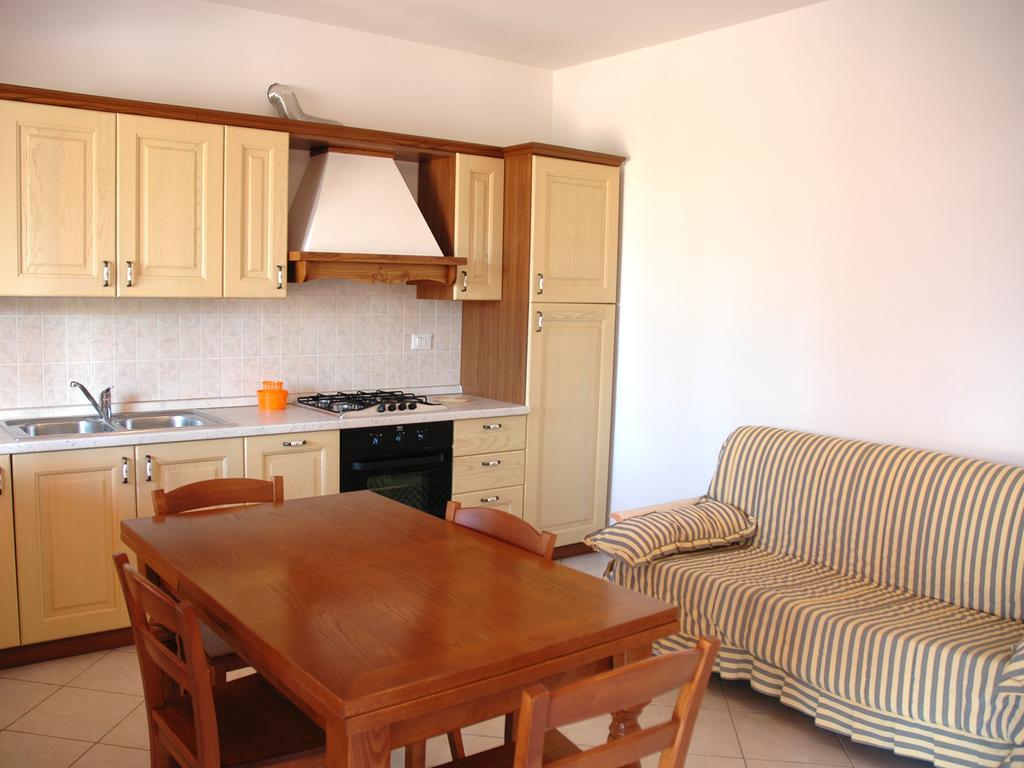 Ferienwohnung Baia Fiorita Porto Azzurro Exterior foto